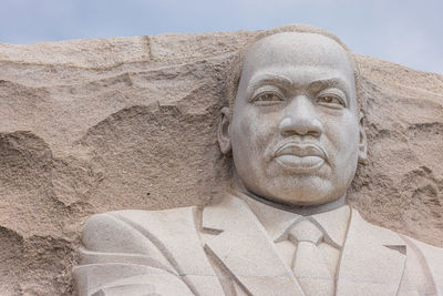 Low angle view of statue on rock