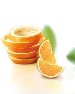 Close-up of yellow fruit on white background