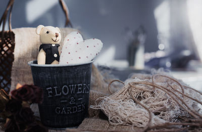 Close-up of coffee for sale in basket on table