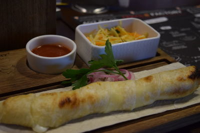 Close-up of served food on table