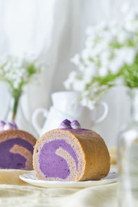 Close-up of purple cake on table