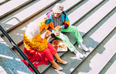 Low section of woman sitting on steps