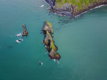 High angle view of cliff in the sea