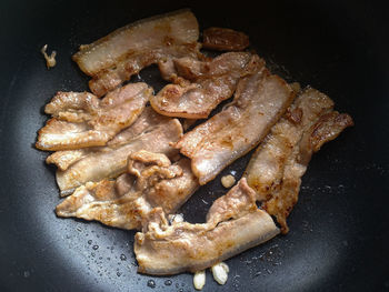 High angle view of meat in cooking pan