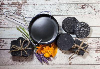 High angle view of various flowers in bowl on table