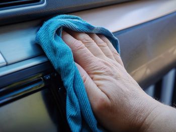 Close-up of man holding hands