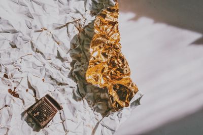 High angle view of dry leaf on table