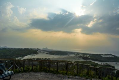 Scenic view of landscape against sky during sunset