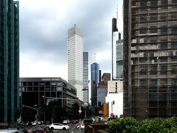 Buildings in city against sky