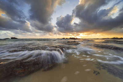 Scenic view of sea against sky during sunset