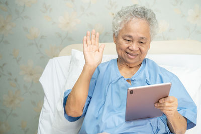 Young man using digital tablet