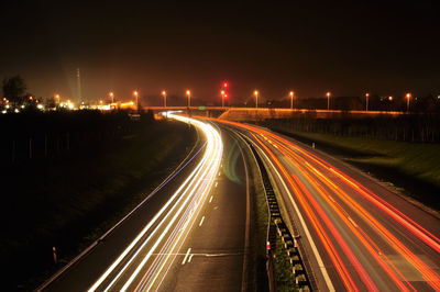 Light trails on road at night