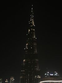 Illuminated buildings in city at night