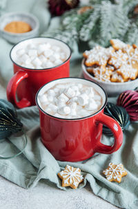 Cozy winter and christmas setting with hot cocoa and homemade cookies