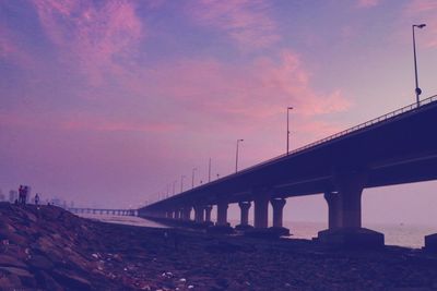 Bridge against sky during sunset