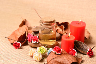 Close-up of red roses on table