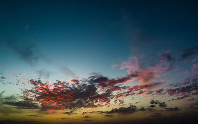 Low angle view of cloudy sky during sunset