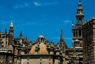 View of buildings in city against sky