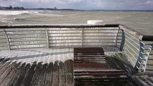 High angle view of beach by sea against sky