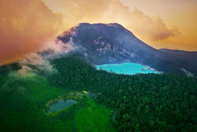 Scenic view of mountains against sky during sunset