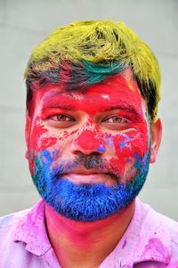 Close-up of portrait of man with powered paint