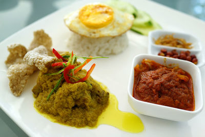 High angle view of nasi lemak served in plate