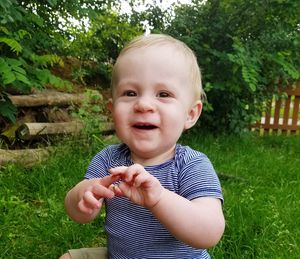Portrait of cute boy smiling