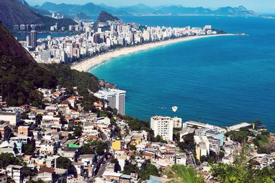 High angle shot of town against calm blue sea