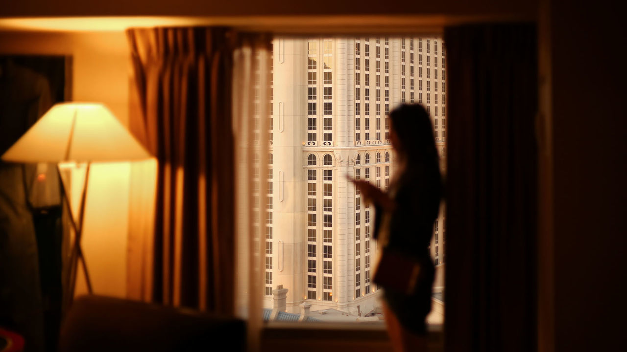 indoors, curtain, window, drapes, home interior, one person, selective focus, real people, standing, lifestyles, bedroom, day, close-up, people