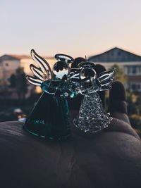 Close-up of christmas decoration against sky