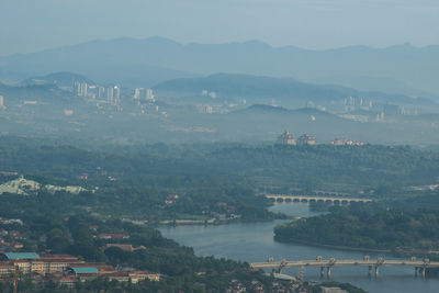 High angle view of city at riverbank