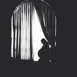 Woman standing at night