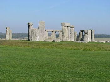 Built structure on field against clear sky