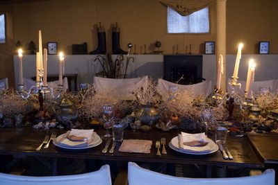 View of lit candles on table