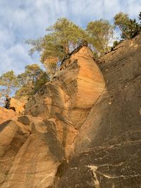 Rock formation on land against sky