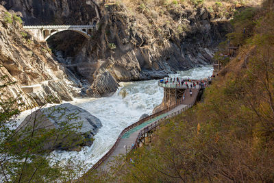 High angle view of water flowing through rocks