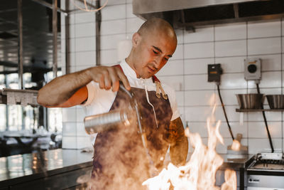 Chef preparing food in kitchen