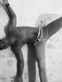 Midsection of man standing on floor