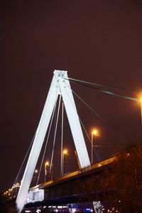 Light trails on suspension bridge at night