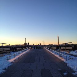 View of road against clear blue sky