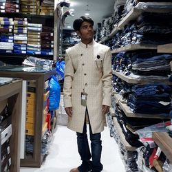 Portrait of man standing in store