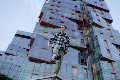 Low angle view of statue against sky