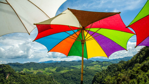 Low angle view of umbrella against sky