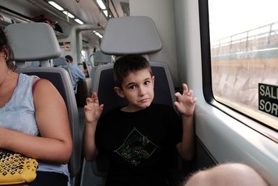 Boy sitting in bus