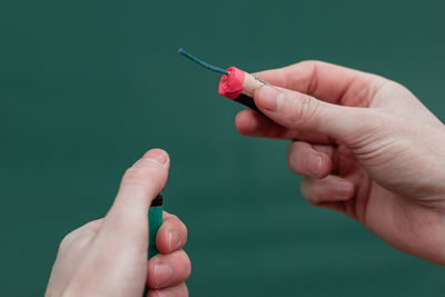 Close-up of people holding hands