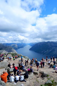 Tourists at preikestolen, the pulpit rock, norway