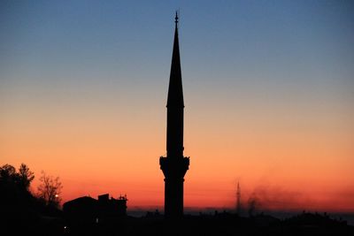 High section of a minaret at sunset