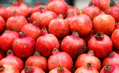 Full frame shot of pomegranates for sale at market stall