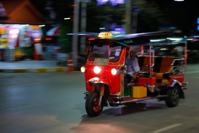 Vehicles on road at night