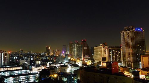 Illuminated cityscape at night